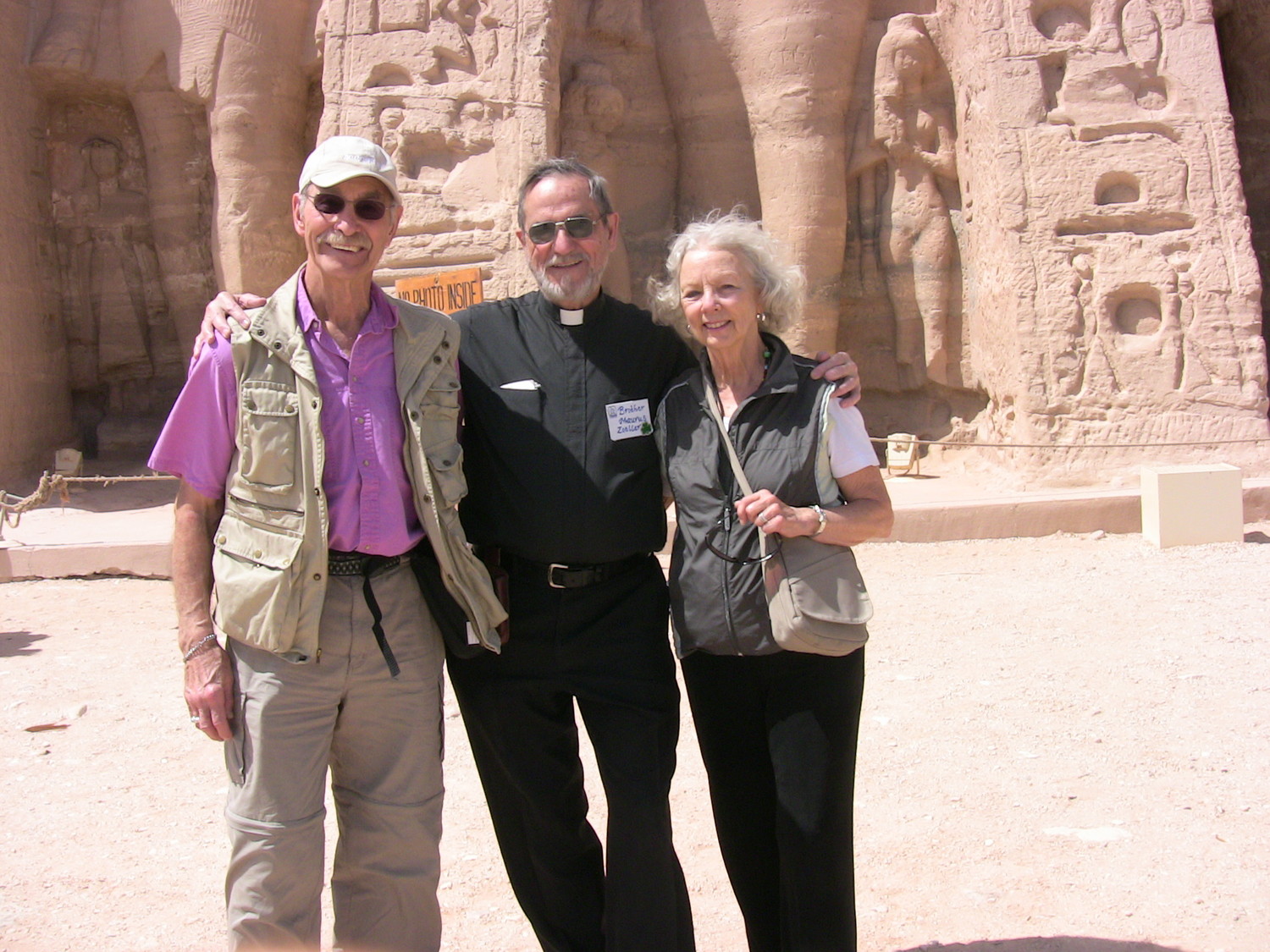 In this 2010 file photo, Thomas and Joan Rillo of St. Charles Borromeo Parish in Bloomington, Ind., pose with Benedictine Brother Maurus Zoeller of Saint Meinrad Archabbey in St. Meinrad during a pilgrimage the monk led to visit Old Testament sites in Egypt. Joan was diagnosed with Alzheimer’s disease that same year.